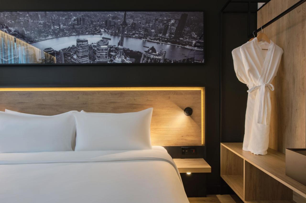 Park Inn By Radisson Shanghai Huanqiugang Екстериор снимка