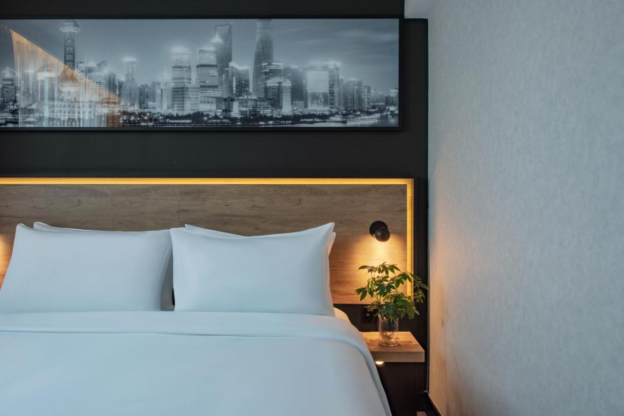 Park Inn By Radisson Shanghai Huanqiugang Екстериор снимка